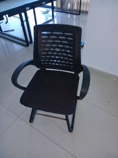 plastic + steel + fabric made chair