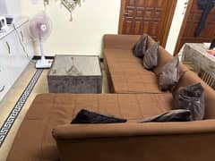 L shape sofa with center table