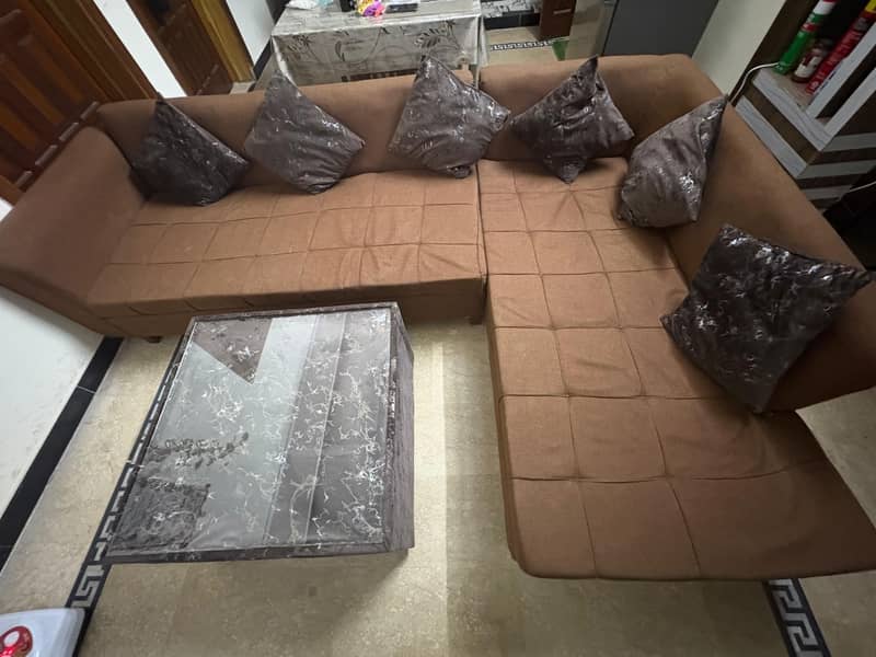 L shape sofa with center table 1