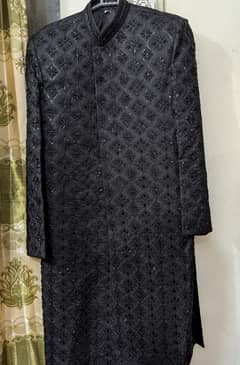 black trending sherwani with kulla