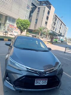 Grande Toyota Altis B2B Genuine – Grey Color with Installed X Bumper