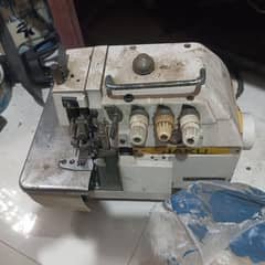 singer over lock machine