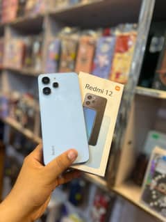 Redmi 12 8/128 lush condition & contact no 03021404007