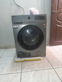 Front load. . new model Toshiba 8/5 kg. . just slightly used