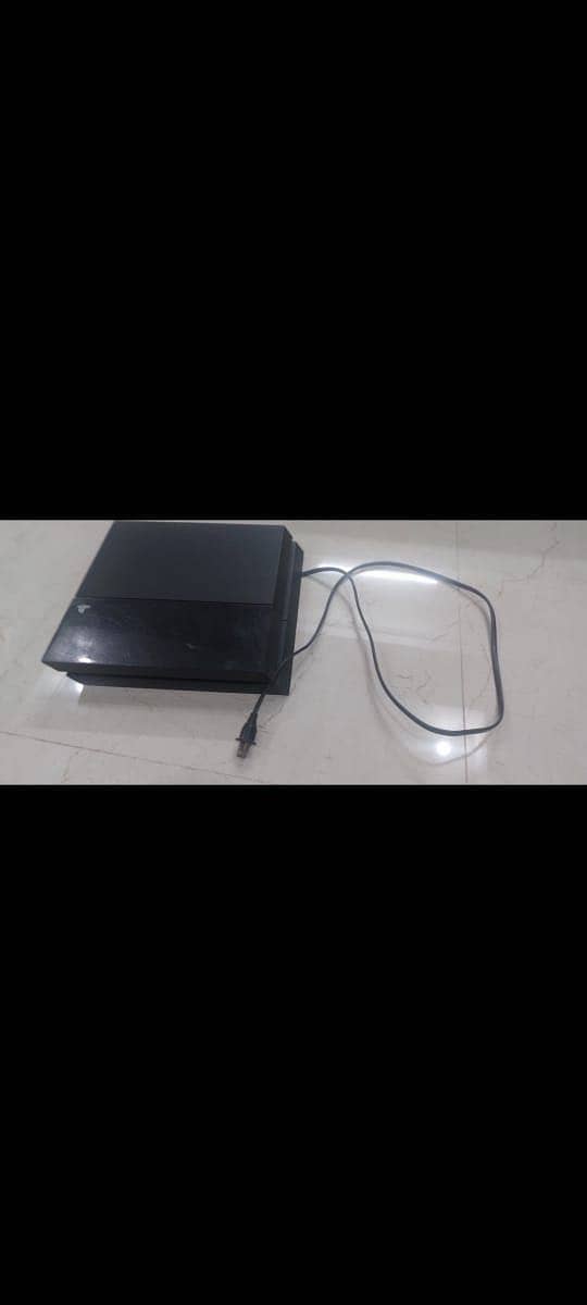 PS4 with Games And Controller 1