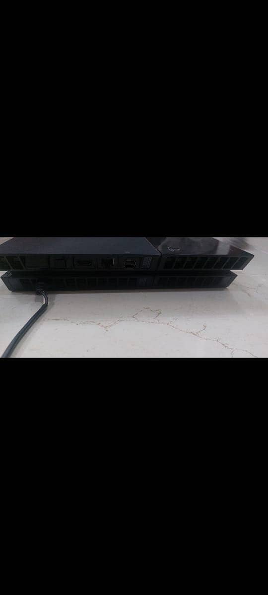 PS4 with Games And Controller 3
