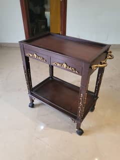 Tea trolley with 2 drawers Colour dark browm polish Used 15 k