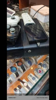 Xbox 360 E WITH TWO CONTROLLERS, HDMI, ADOPTER, REMOTE, GTA 5 CD