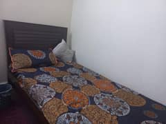 single wooden bed