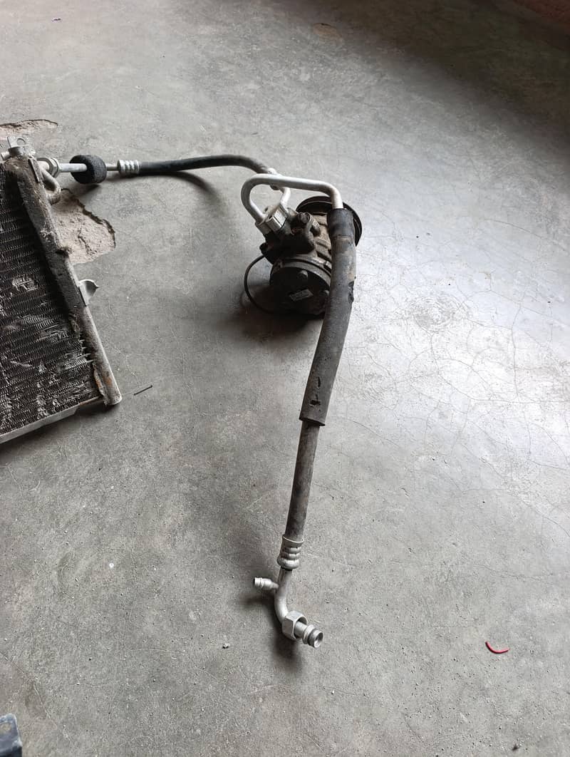 ac compressor and radiator and pipe lines 7