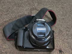 canon 1300d with 2 lenses,charger,64gb memory card and bag