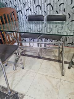 Glass top dining table