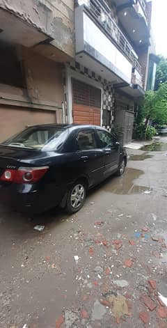 Black Honda city 2008 model.