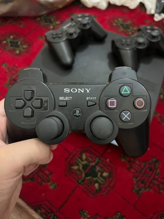 PS3 with 3 controllers 0
