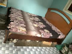 Used double bed with spring mattress