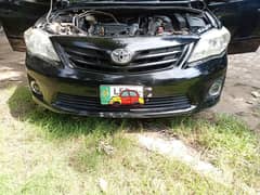 Toyota Corolla XLI converted into GLI 2012 model.    Lahore number .