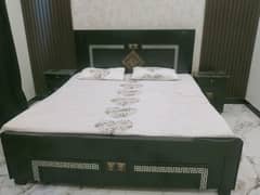 wooden bed 2 sides table