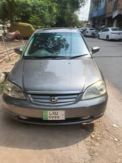 Honda Civic 2003 vti oreal prosmetic
