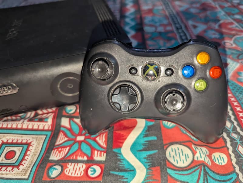 x box 360 with controller with 50 gmaes 1
