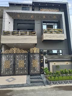 6 Marla double story house brand new home ideal and hot location carpet road water electricity available near canal road near sozo water park near park 3D ultra model design Spanish look furnished home with wood work