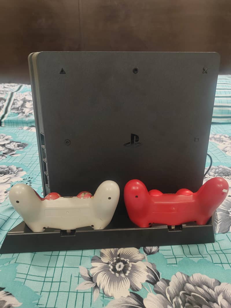 Ps4 Slim with 2 controller and 1tb and Games 5