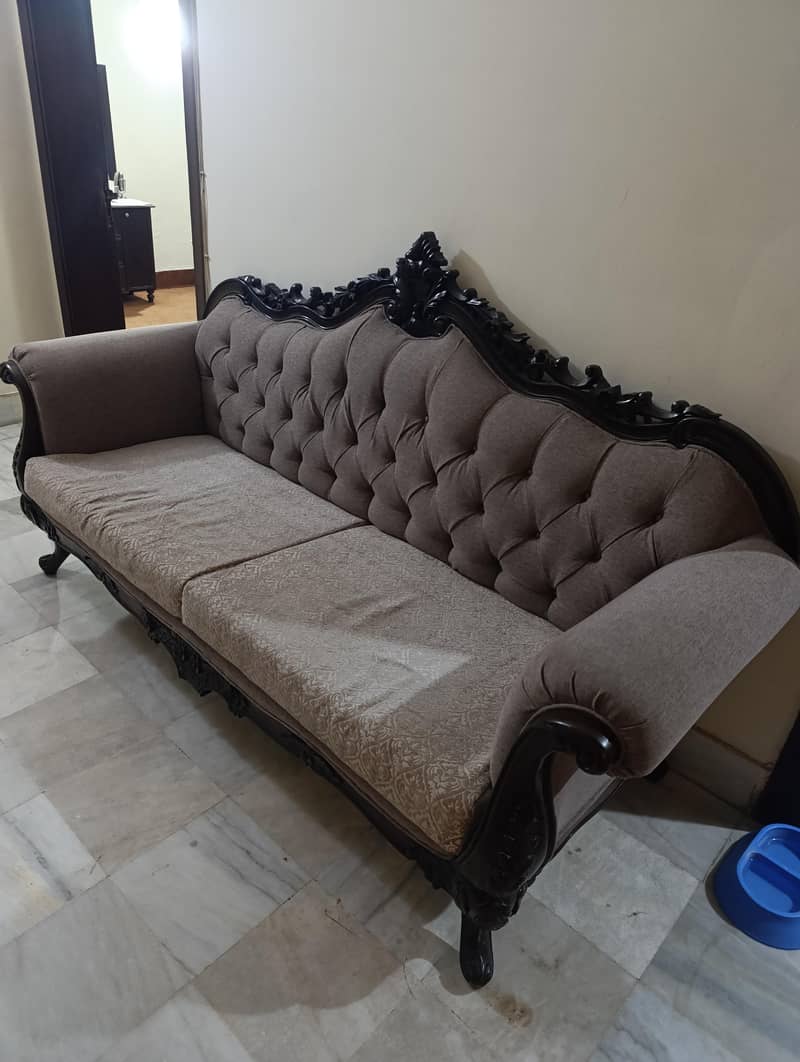5 seater sofa with 2 side tables and one center table. 1