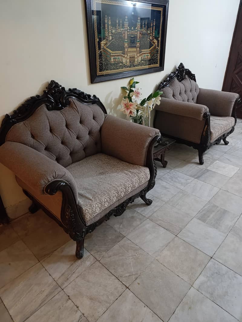 5 seater sofa with 2 side tables and one center table. 2