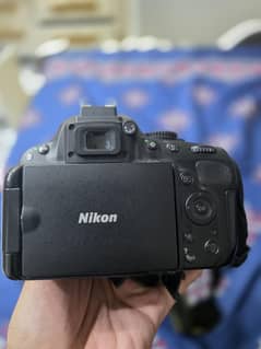nikon D5100 with Sigma DC 70-300mm