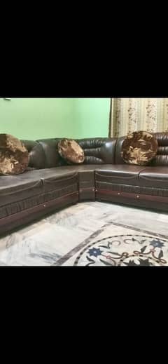 brown  colour leather  L shaped sofa set . bilkul new hai