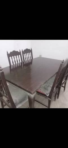 dining table with 5 chairs . 100% wood .