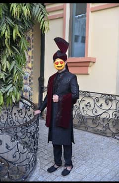 Regal Black Sherwani with Maroon Turban – Traditional Groom Look