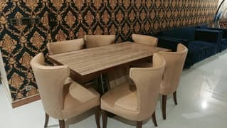 wooded dinning table with 6 chairs