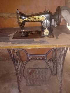sewing machine  with stand in Rs. 12000