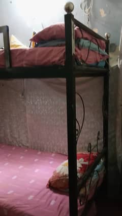 Bunker bed. Heavy gage iron, suitable for all age persons.