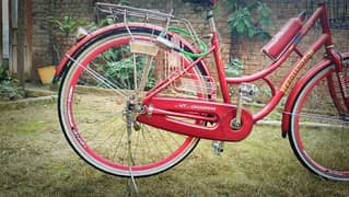 maroon shining bicycle