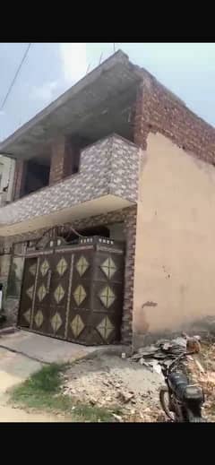 5 MARLA DOUBLE STOREY USED HOUSE GROUND FLOOR IS COMPLETE AND FIRST FLOOR IS ONLY GREY STRUCTURE IS MUHAFIZ TOWN PHASE 2 DEFENCE ROAD IS FOR SALE