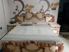 King sized bed with Dresser and Cubbet