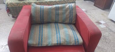 Sofa cumbed with cushions