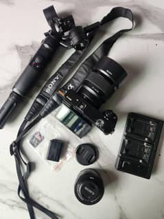 Sony @6000 with kit lens and 50mm FE 1.8 and Zhiyun Crane M2 with box