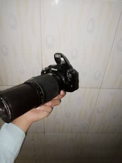 Nikon d3100 with 70/300 all ok all assesries price kum nhi honi