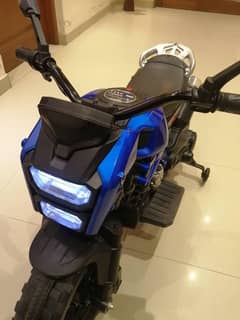 kids electric ride on bike