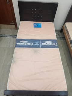 Single bed with mattress and sofa