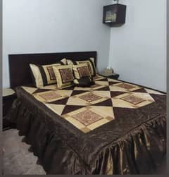 king size bed with two side tables