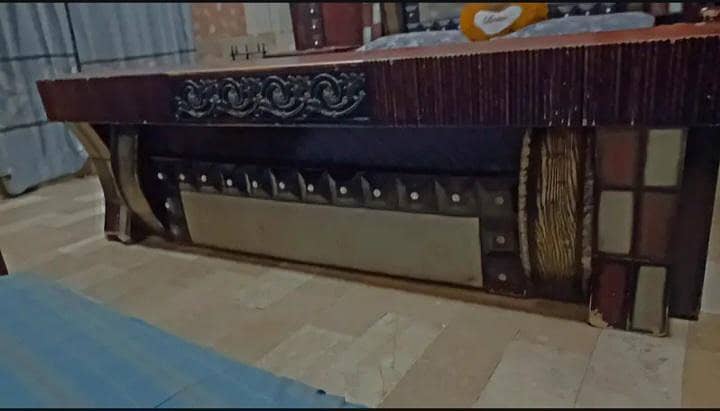 Stylish king size bed for comfortable sleeping with two side tables 3