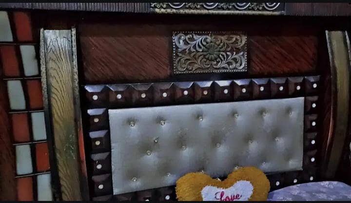 Stylish king size bed for comfortable sleeping with two side tables 4