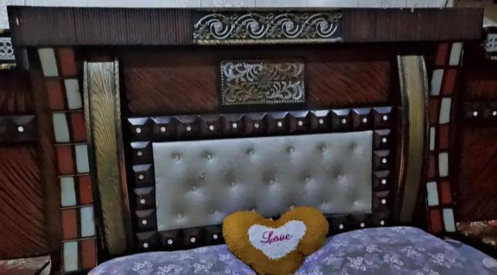 Stylish king size bed for comfortable sleeping with two side tables 5