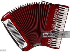 full size accordion in mint condition with leather case