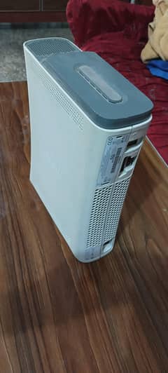 Xbox 360 with two controllers