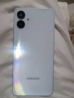 Samsung a06 new condition with all asseciries and 7 month warranty