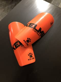 FOOTBALL SHIN PADS KELME BRANDED
